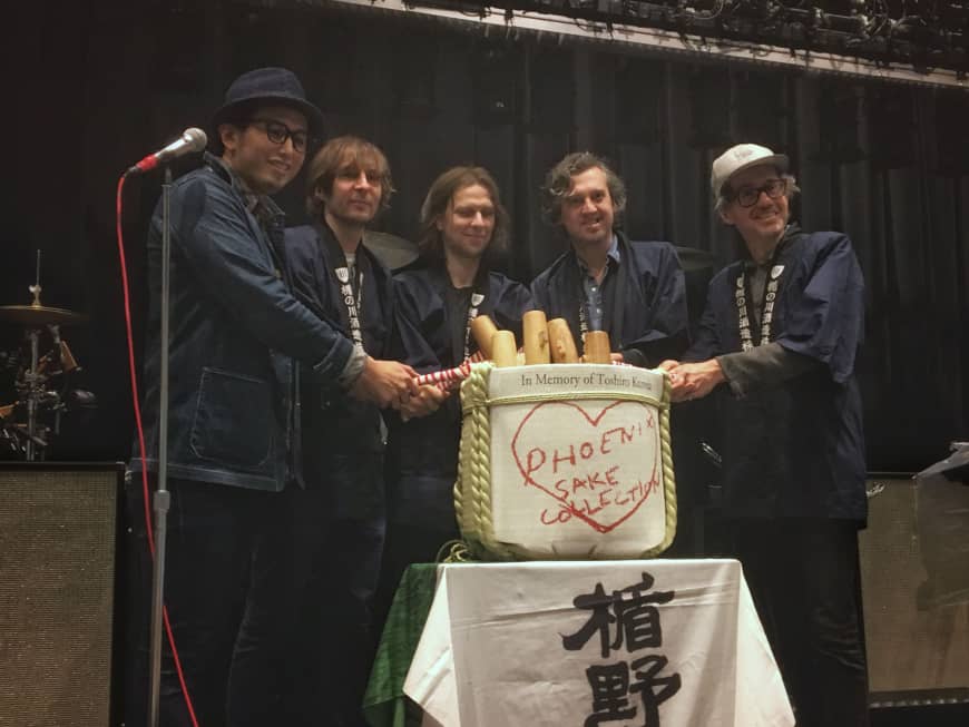 Getting the party started: (From left) Masashi Togami breaks open a ceremonial sake cask with Phoenix band members Thomas Mars, Deck d