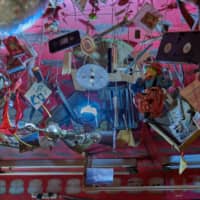 Making art out of the ordinary: Imagination Pika Space\'s ceiling is hung with a collection of curios, household items and junk. | ROSS RANDLES