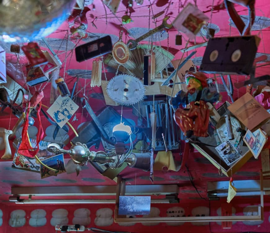 Making art out of the ordinary: Imagination Pika Space's ceiling is hung with a collection of curios, household items and junk. | ROSS RANDLES