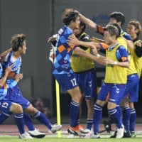 V-Varen\'s Yu Hasegawa (17) celebrates with his teammates after scoring against Marinos during their Levain Cup match on Wednesday in Nagasaki. | KYODO