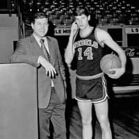 Ole Miss men\'s basketball coach Robert \"Cob\" Jarvis poses with Rebels star Johnny Neumann on campus in March 1971. Neumann led the NCAA in scoring (40.1 points per game) that season. | AP