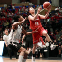 Japan point guard Nako Motohashi goes for a layup against Belgium during Friday\'s international exhibition at Adastria Mito Arena. | KAZ NAGATSUKA