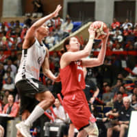 Japan forward Moeko Nagaoka attacks the basket against Belgium in Mito, Ibaraki Prefecture, on Friday night. | KAZ NAGATSUKA