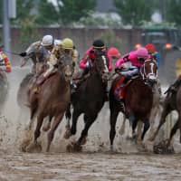 Flavien Prat rides Country House (20) , Tyler Gaffalione is aboard War of Will (1) , Luis Saez is aboard Maximum Security (7) and John Velazquez rides Code of Honor (13) during the 145th running of the Kentucky Derby at Churchill Downs Saturday. | BRIAN SPURLOCK / VIA USA TODAY SPORTS