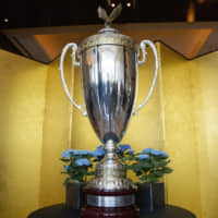The President\'s Trophy, a trophy presented by President Donald Trump to Summer Grand Sumo Tournament winner Asanoyama on Sunday, is displayed in the lobby of the Palace Hotel Tokyo. | AP
