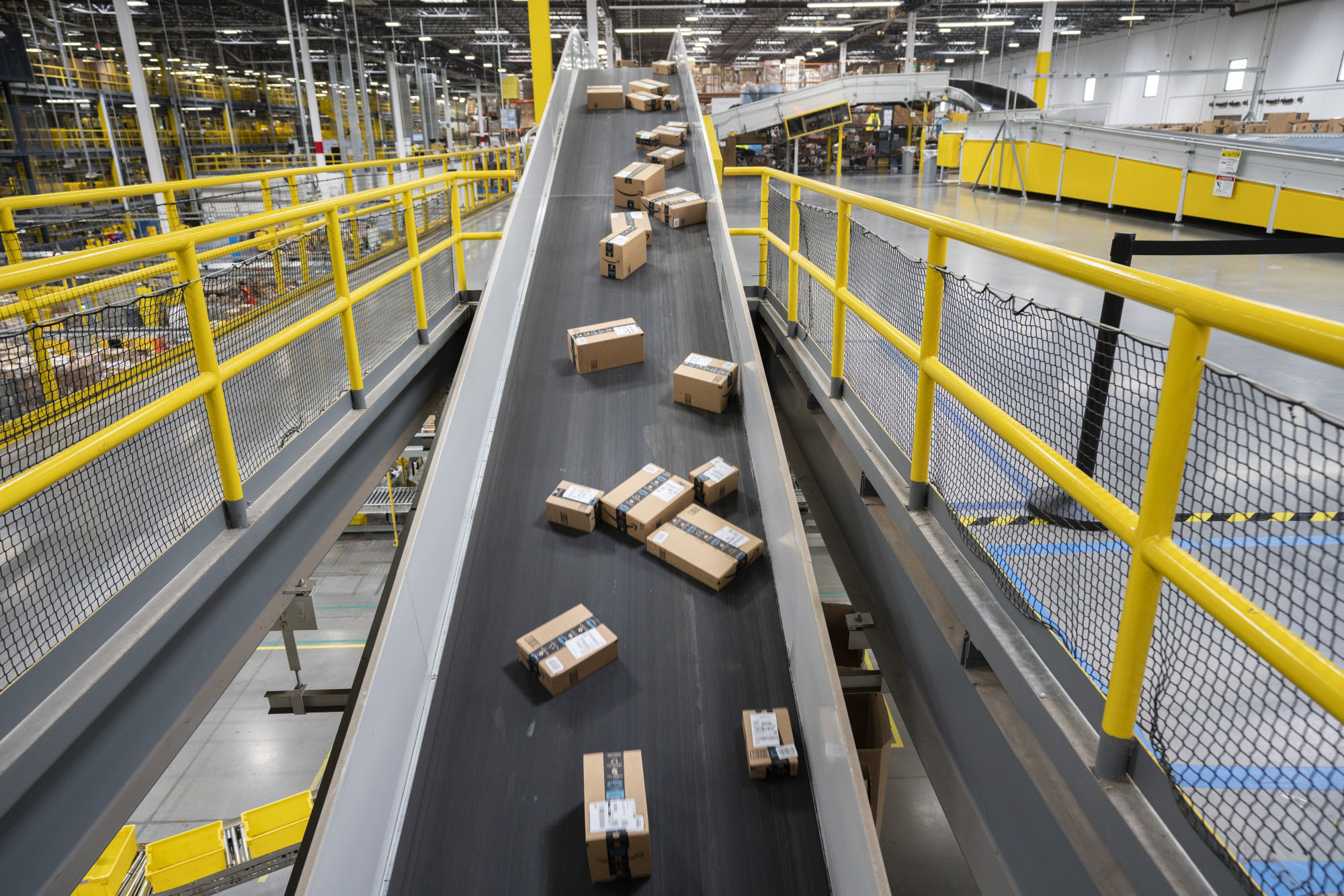Packages are sorted at an Amazon.com Inc. fulfillment center in Baltimore. | BLOOMBERG