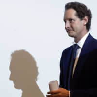 Fiat Chrysler Automobiles Chairman John Elkann arrives for an event in Milan on May 27. | AP
