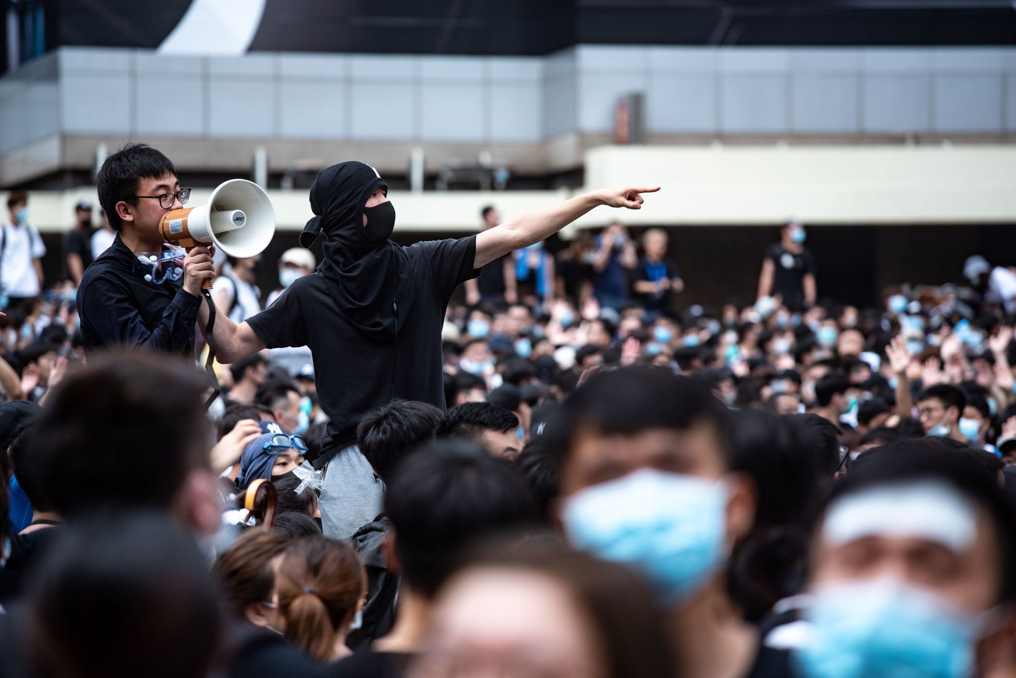 Protesters occupy the roads near the Legislative Council and government headquarters in Hong Kong on Wednesday after authorities delayed the second rounds of debate of a controversial bill allowing extradition to mainland China. | AFP-JIJI