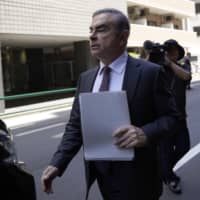 Carlos Ghosn, former chairman of Nissan Motor Co., leaves his lawyer\'s office in Tokyo on May 23. | BLOOMBERG