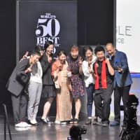 Chef Zaiyu Hasegawa (second from right) and his team from Japanese restaurant Den receive the Art of Hospitality award at the World\'s 50 Best Restaurants awards ceremony on Wednesday at Marina Bay Sands in Singapore. | KYODO