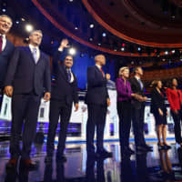 Wednesday\'s debaters in Miami, from left: Bill de Blasio, Tim Ryan, Julian Castro, Cory Booker, Elizabeth Warren, Beto O\'Rourke, Amy Klobuchar, Tulsi Gabbard, Jay Inslee and John Delaney. | AP