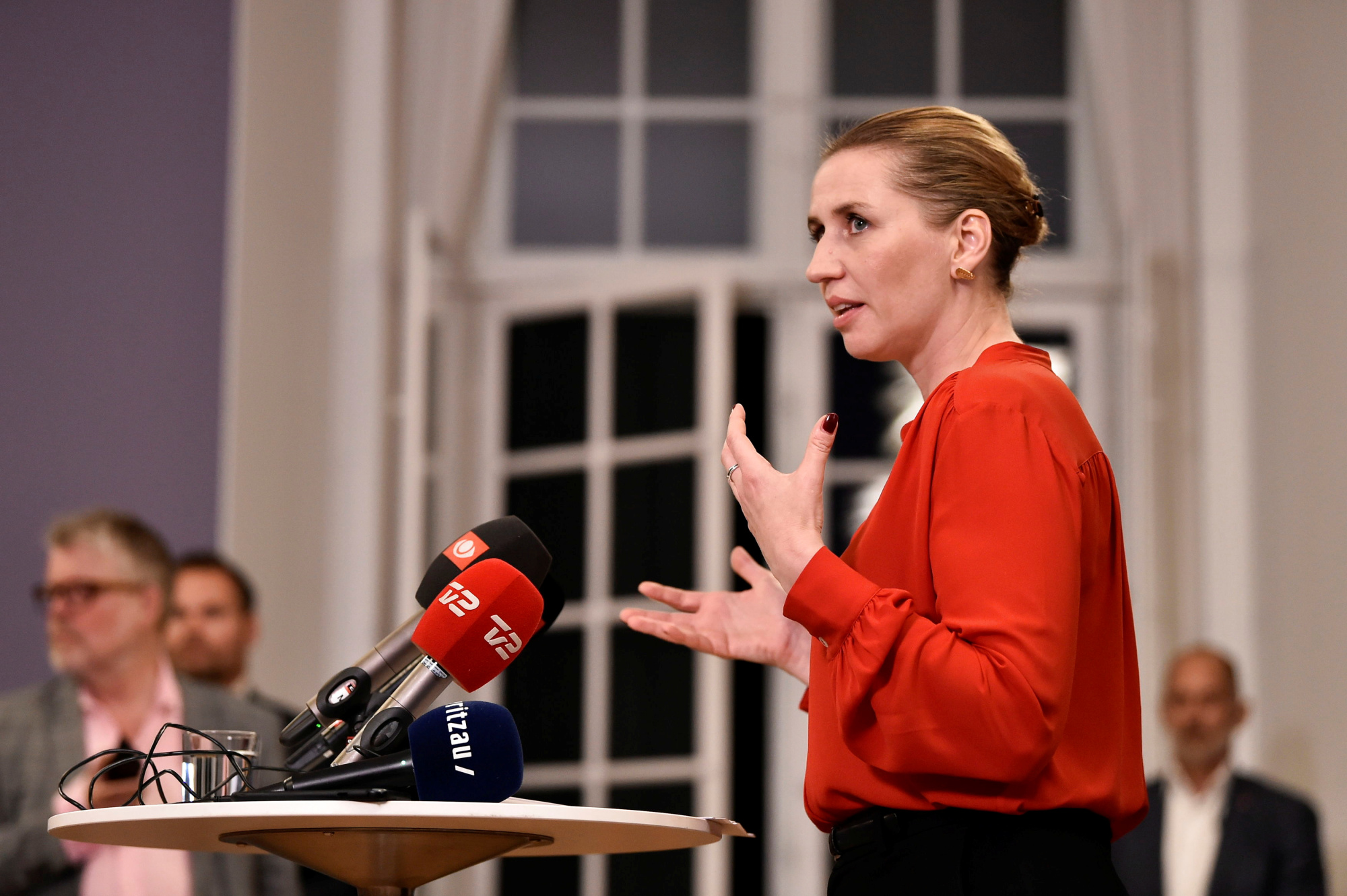 Mette Frederiksen addresses the press after finalizing government negotiations at Christiansborg Castle in Copenhagen shortly after midnight on Wednesday. | RITZAU SCANPIX / VIA REUTERS
