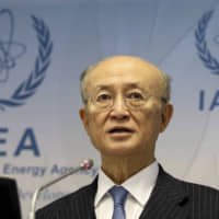 Director General of the International Atomic Energy Agency Yukiya Amano of Japan addresses the media during a 2018 news conference after a meeting of the IAEA board of governors at the International Center in Vienna. Amano is urging world powers to continue dialogue with Iran to keep it in the landmark 2015 deal aimed at preventing the country from building nuclear weapons. | AP