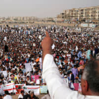 Members of Pakistan\'s Pashtun community rally against alleged human rights violations in Karachi on May 13, 2018. The rally was organized by the Pashtun Tahaffuz Movement. | REUTERS