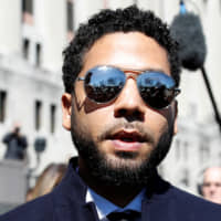 Actor Jussie Smollett leaves court after charges against him were dropped by state prosecutors in Chicago March 26. | REUTERS
