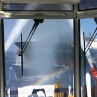 This Thursday photo made available by the Norwegian shipowner Frontline shows the crude oil tanker Front Altair through the observation window of a fire boat as water cannon operate to fight the fire onboard the Norwegian ship in the Gulf of Oman. The U.S. Navy rushed to assist the stricken vessels in the Gulf of Oman, off the coast of Iran, as two oil tankers came under suspected attack amid heightened tension between Iran and the U.S. | FRONTLINE / VIA AP
