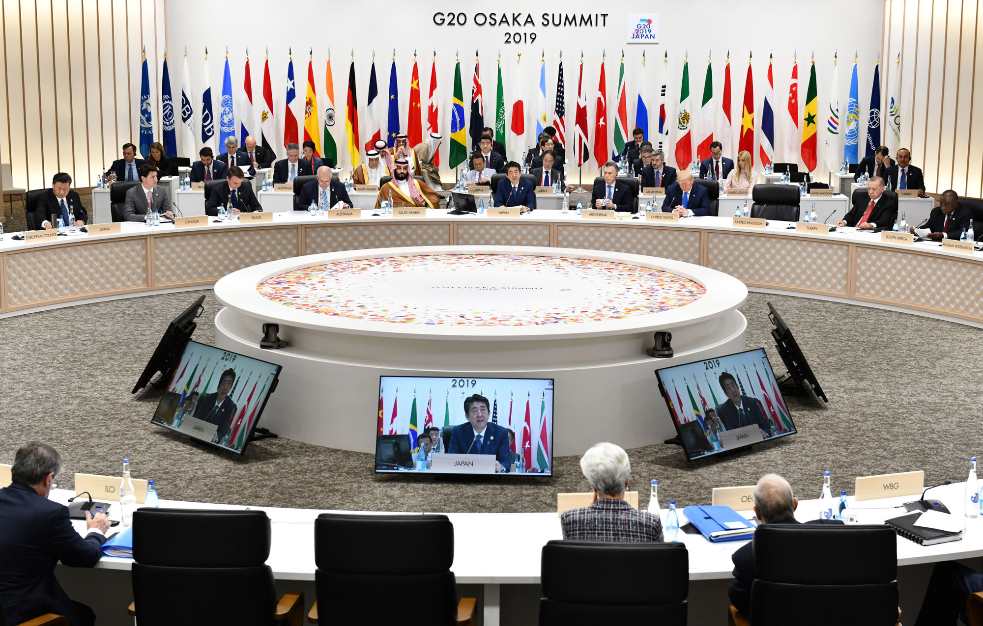 Prime Minister Shinzo Abe addresses a session of the Group of 20 summit in Osaka on Saturday. | BLOOMBERG