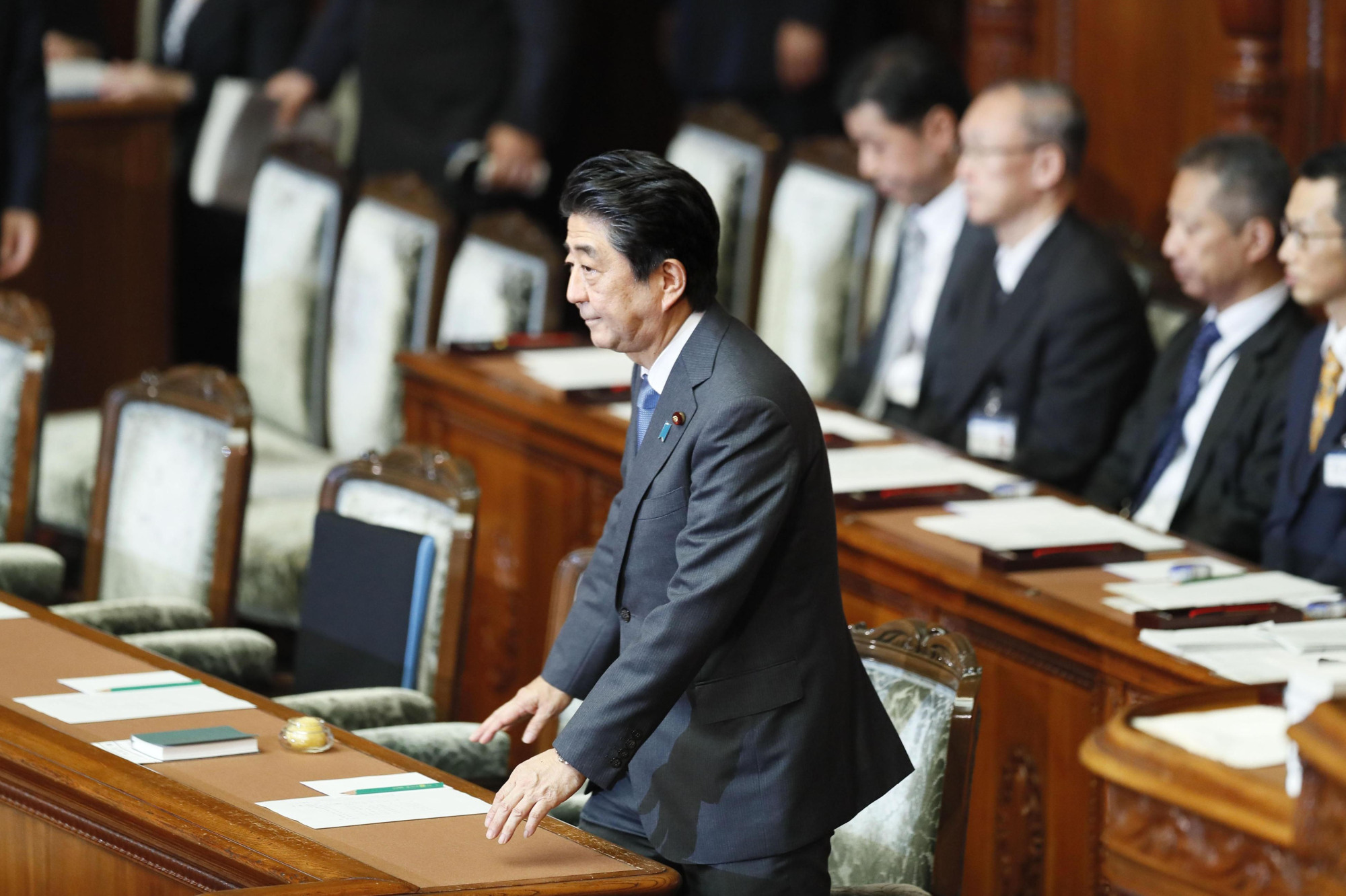 Prime Minister Shinzo Abe survives a no-confidence motion submitted against the Cabinet by opposition parties in the House of Representatives on Tuesday. | KYODO