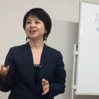 Jun Yamamoto, head of the sexual assault victims group Spring, speaks to journalists in Tokyo on May 31. | REUTERS