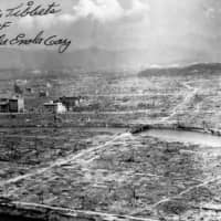 An image of Hiroshima, destroyed after the nuclear bomb of Aug. 6, 1945, with the autograph of \"Enola Gay\" bomber pilot Paul Tibbets. | VIA WIKIMEDIA COMMONS (PUBLIC DOMAIN)