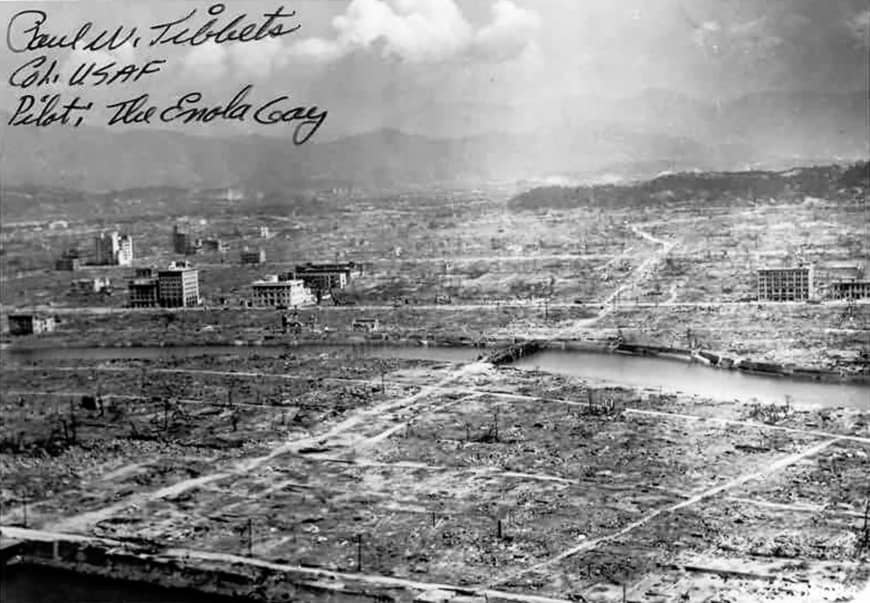 An image of Hiroshima, destroyed after the nuclear bomb of Aug. 6, 1945, with the autograph of 'Enola Gay' bomber pilot Paul Tibbets. | VIA WIKIMEDIA COMMONS (PUBLIC DOMAIN)