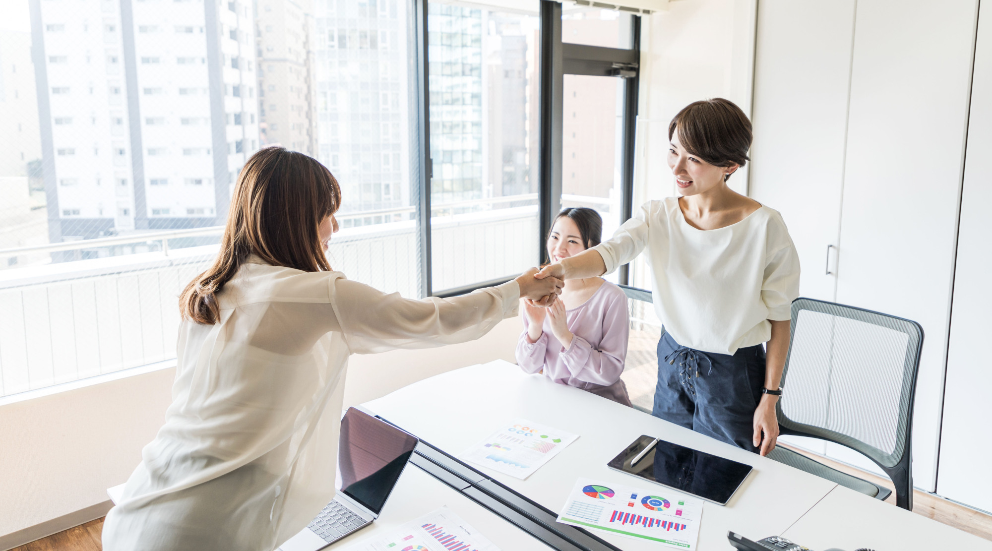 Changing workplace: Some Japanese companies have been experimenting with a radical idea &#8212; compliments. | GETTY IMAGES