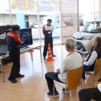 Gearing up: Elderly drivers attend a road safety class in Mie Prefecture in 2017. | KYODO