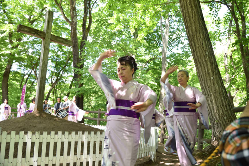Women take part in the ‘Nanyadoyara’ dance around the purported grave of Jesus Christ during the Christ Festival in Shingo, Aomori Prefecture. | COURTESY OF SHINGO VILLAGE