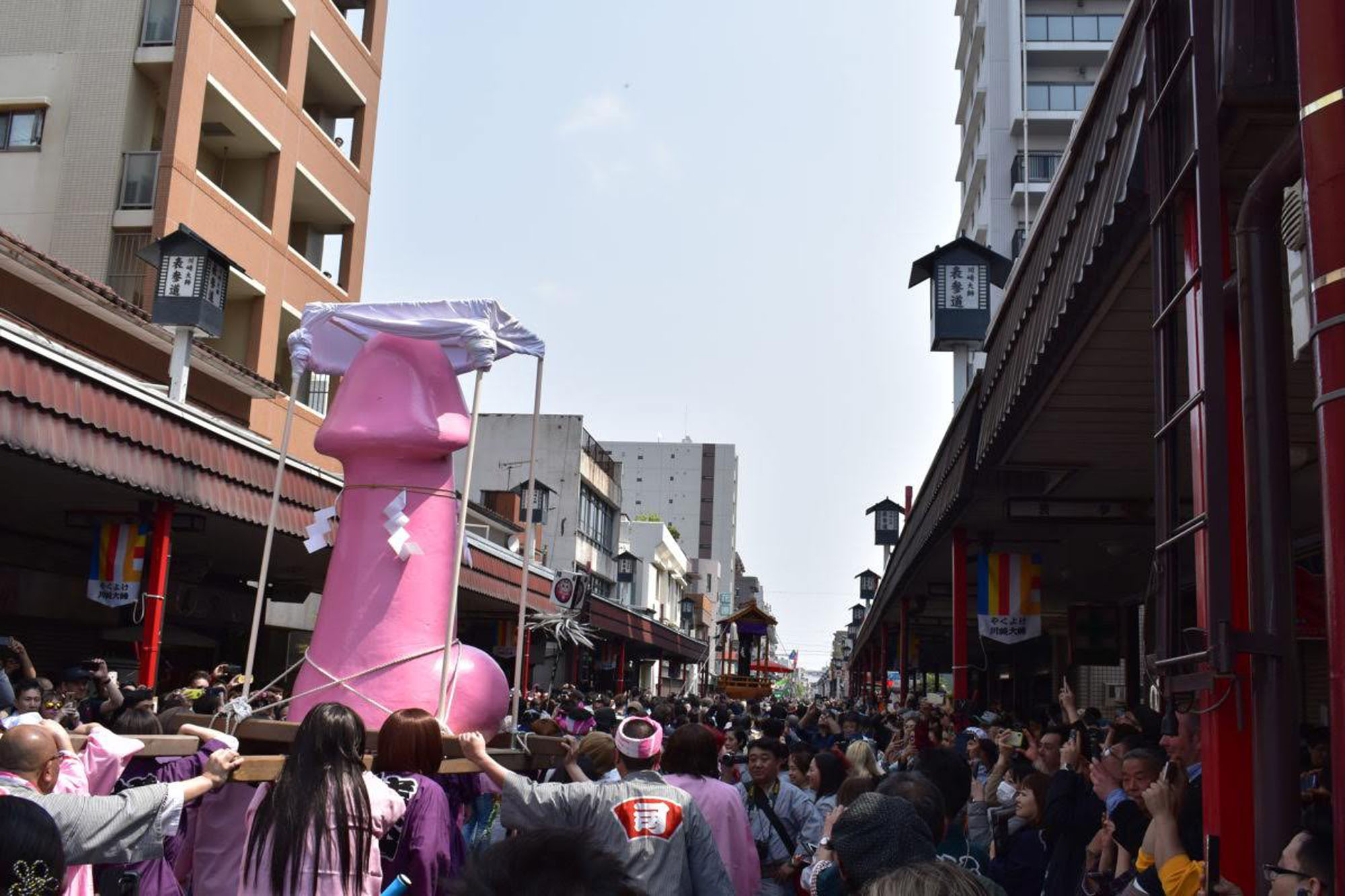 Participants carry a giant effigy of a penis during the Kanamara Festival in Kanagawa Prefecture. | COURTESY OF OMATSURI JAPAN