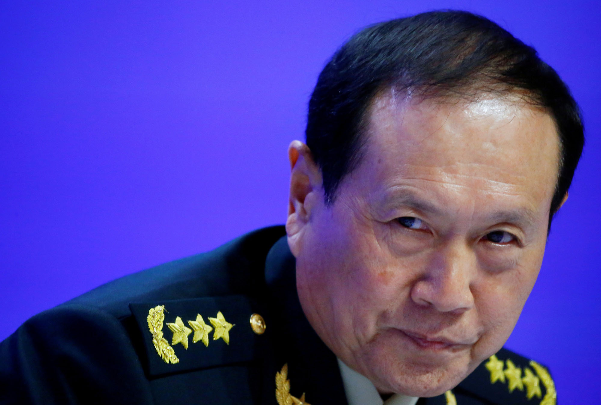 Chinese Defense Minister Wei Fenghe attends the Shangri-la Dialogue on June 2. | REUTERS