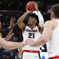 Former Gonzaga forward Rui Hachimura, a Toyama native, is seen shooting the ball in an NCAA Tournament first-round game against Fairleigh Dickinson in March. The NBA Draft is an event that has had an international flavor for years, and experts say Hachimura will be a first-round pick. | AP