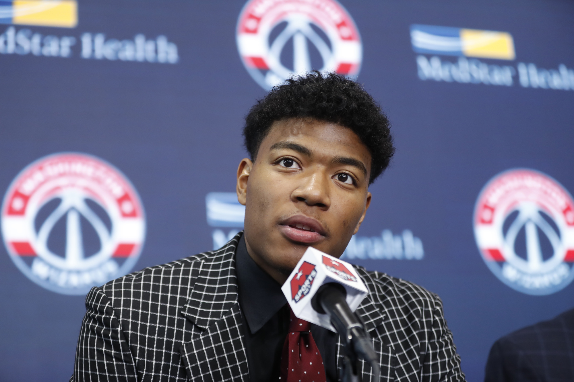 Washington Wizards' Rui Hachimura, who played at Gonzaga, stands