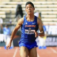 University of Florida sprinter Abdul Hakim Sani Brown runs a wind-assisted 9.96-second 100 meters at the NCAA Division I Outdoor Track &amp; Field Championships in Austin, Texas, on Wednesday. | KYODO
