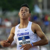  Japanese sprinter Abdul Hakim Sani Brown set a new national record with a time of 9.97 seconds in the men\'s 100 meters at the NCAA Division I outdoor athletics championships on Friday.  | KYODO