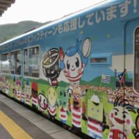 A train, dubbed \"Scrum Iwate Fifteen\" operated by Sanriku Railway Co., features 35 local PR mascot characters from within Iwate Prefecture. The train, which will help promote the Rugby World Cup, was unveiled to reporters at Kamaishi Station in Kamaishi, Iwate Prefecture, on Tuesday. | KYODO