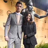 Actors Ansel Elgort and Eva Longoria pose together Wednesday after announcing the nominees for the 2015 Screen Actors Guild Awards at the SilverScreen Theater in the Pacific Design Center in West Hollywood, California. | AFP-JIJI