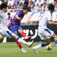 FC Tokyo star midfielder Takefusa Kubo (center) turned 18 on Tuesday as he prepares to potentially make his debut with the Samurai Blue in this week\'s friendlies. Now several top European clubs are said to be vying to sign the player known as \"the Japanese Messi.\" | KYODO