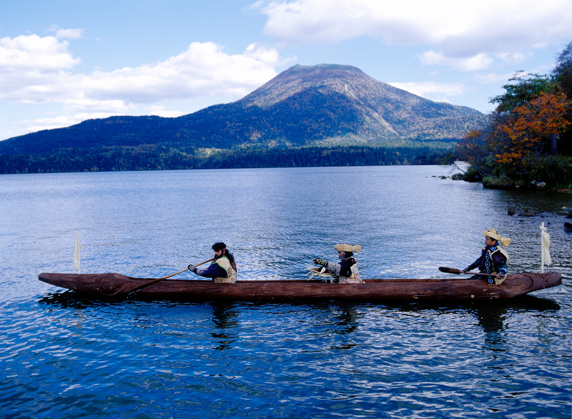 Marimo (moss balls) are brought back to Lake Akan during an annual Ainu ritual.