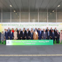 Representatives of the G20 Niigata Agriculture Ministers\' Meeting in front of Toki Messe. | REUTERS