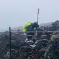 Shaun McKenna nears the summit of Mount Fuji. | OSCAR BOYD