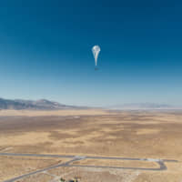 A Loon internet balloon carrying solar-powered mobile networking equipment flies over the company\'s launch site in Winnemucca, Nevada, Thursday. | COURTESY LOON / HANDOUT / VIA REUTERS