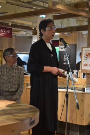 Masaaki Kanai, chairman of Ryohin Keikaku Co., gives a speech at a new Muji store at the Musashino Art University's Ichigaya campus in Tokyo. | MASAMI KOIZUMI