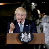 British Prime Minister Boris Johnson delivers a speech on domestic priorities at the Science and Industry Museum in Manchester on Saturday. | REUTERS