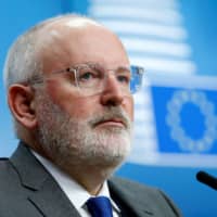 European Commission First Vice President Frans Timmermans addresses a news conference in Brussels in 2018. | REUTERS