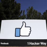 Tge Facebook logo is seen at the company\'s headquarters in Menlo Park, California in March last year. | AP