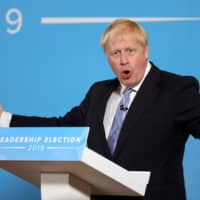 Conservative MP and leadership contender Boris Johnson takes part in a Conservative Party Hustings event in Belfast, Northern Ireland, on Tuesday. | AFP-JIJI