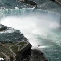 The Horseshoe section of Niagara Falls is seen in 2012 in Niagara Falls, New York. A man who was swept over the largest of the Niagara Falls has been recovered alive, found sitting on a rock in the river below with nonlife-threatening injuries, Canadian police said Wednesday. | AFP-JIJI