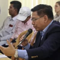 Myanmar\'s permanent foreign secretary, U Myint Thu, speaks during a meeting with representatives of Rohingya Muslim refugees in Cox\'s Bazar, Bangladesh, Sunday. Thu led a 10-member delegation for the weekend talks in refugee camps to discuss creating conditions for the safe repatriation of hundreds of thousands of Rohingya Muslim refugees in Bangladesh, officials said Sunday. | AP