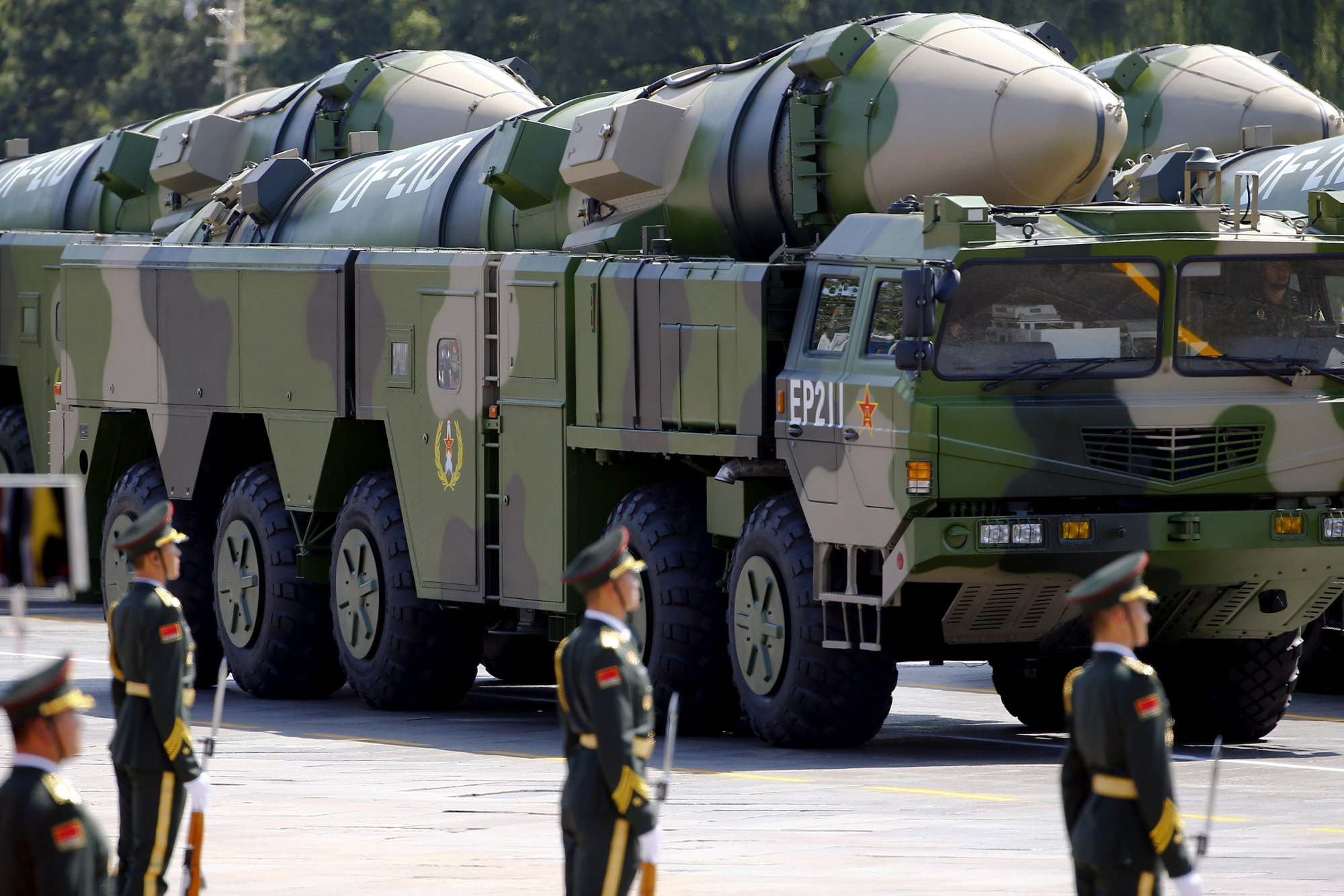 Military vehicles carrying DF-21D ballistic missiles take part in a military parade to mark the 70th anniversary of the end of World War II, in Beijing's Tiananmen Square on Sept. 3, 2015. | REUTERS