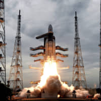 The Indian Space Research Organization\'s Geosynchronous Satellite Launch Vehicle MkIII carrying the Chandrayaan-2 mission lifts off from Satish Dhawan Space center in Sriharikota, India, on Monday. | AP